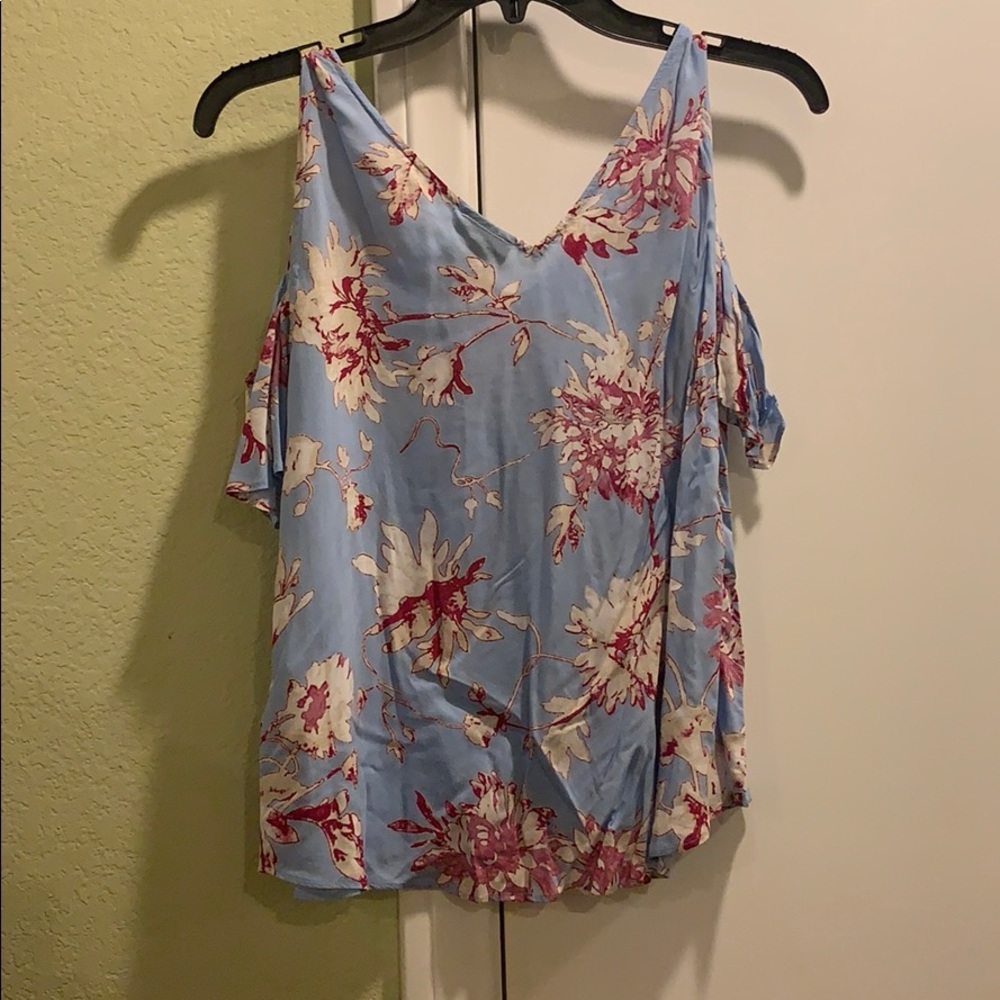 Top worn one cold shoulder